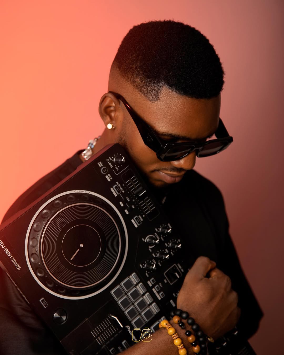 DJ Ambo mixing on the decks